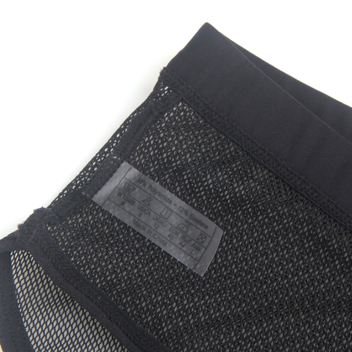 Sexy Schwarze Mesh Panty mit offenem Rücken, 88% Polyamid, 12% Elastan, transparent